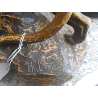 Keramieken leeuw, gesigneerd